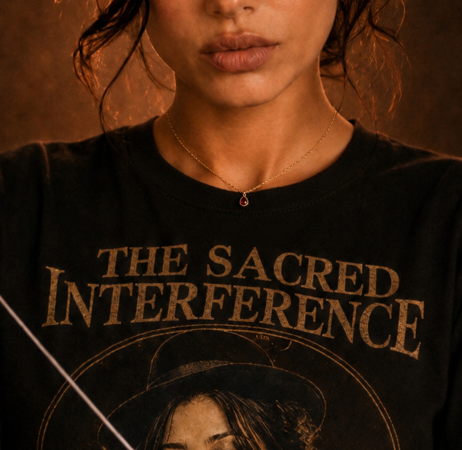Garazi Izar wearing a The Sacred Interference shirt